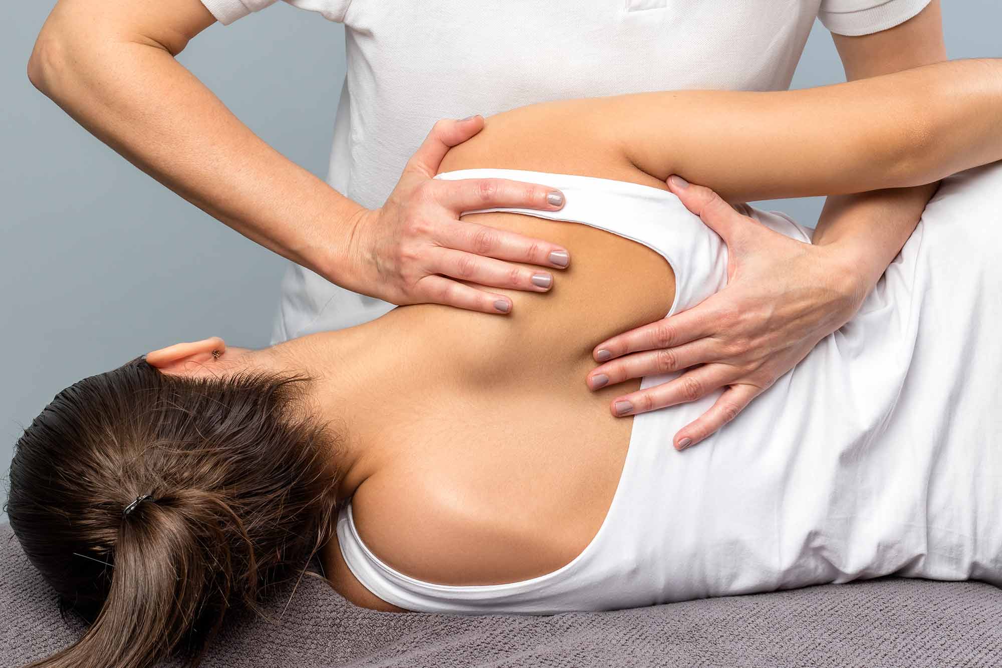Physical Therapist working on patient